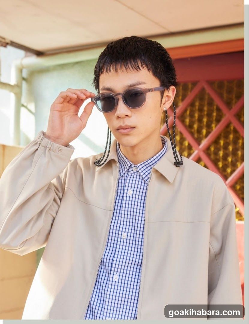 Fashion Model with Sunglasses and Beige Jacket