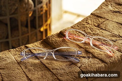 Glasses on Brick Wall