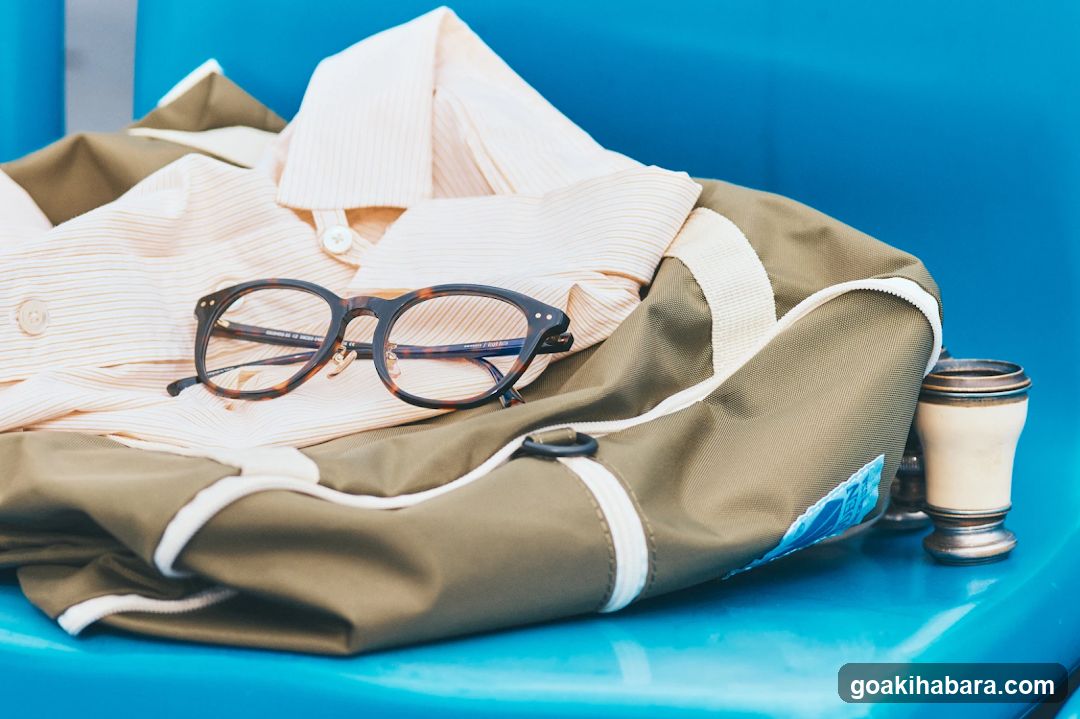 Clothes and Glasses on Blue Seat