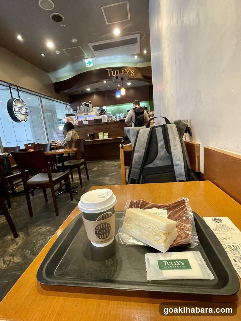 Tully's Coffee Interior with Tray of Food and Drink
