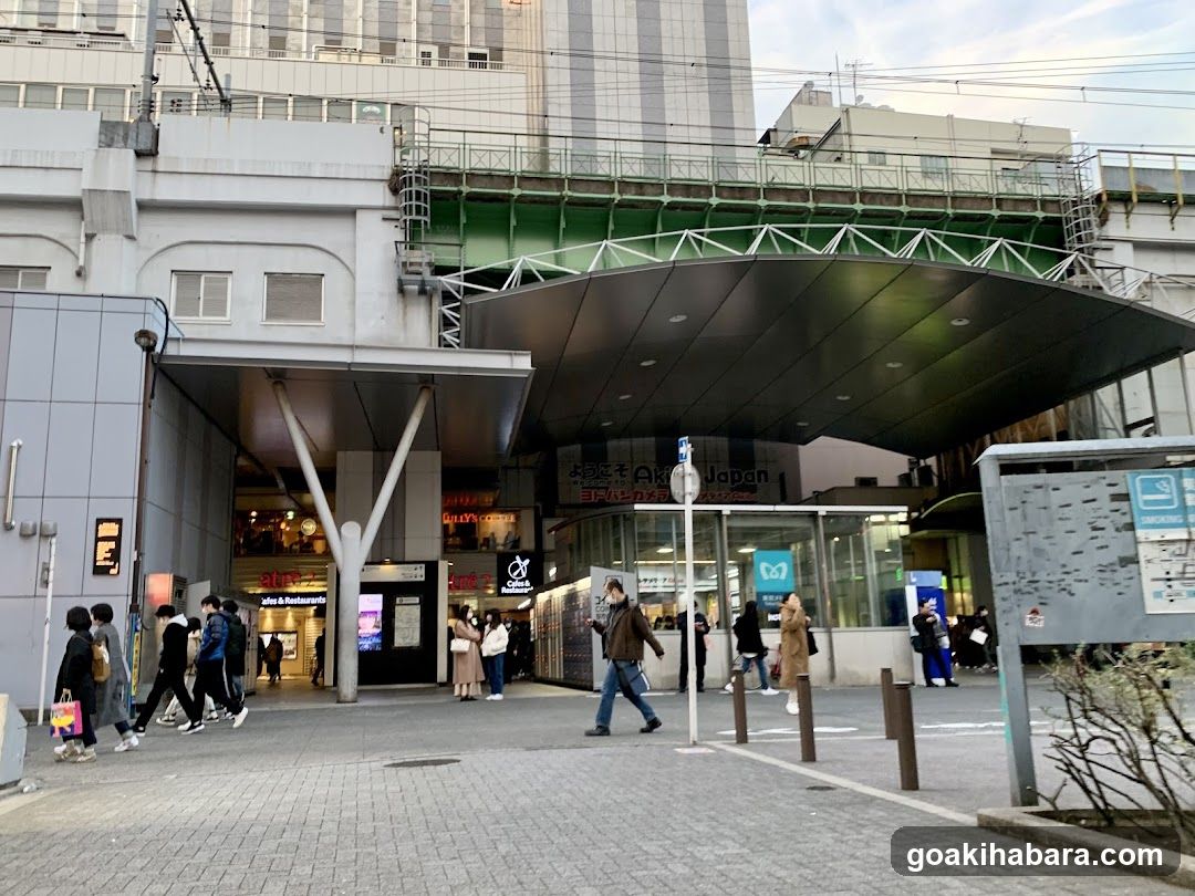 Urban street scene with pedestrians and storefronts