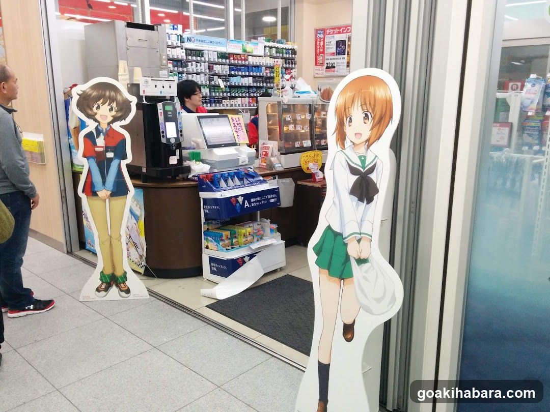 Anime Character Cutouts at Convenience Store Entrance