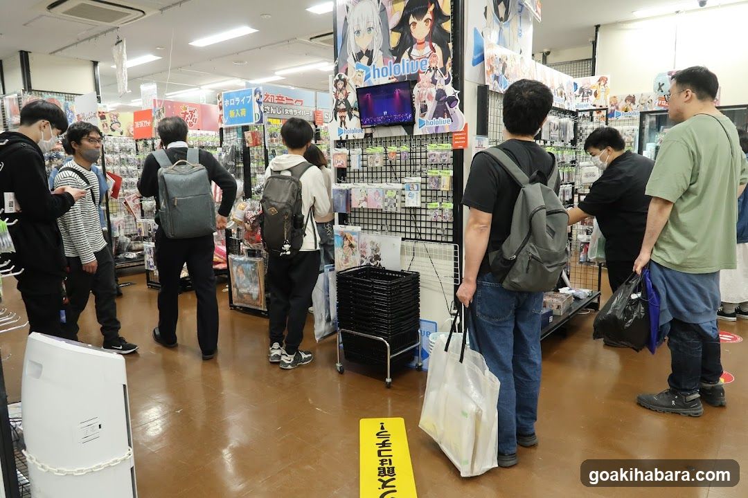 Anime Store Interior with Shoppers