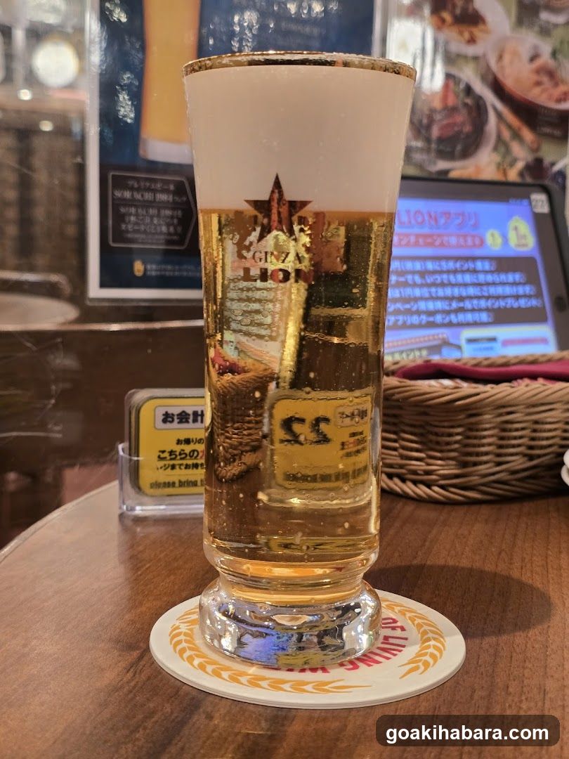 Beer Glass with Foamy Head