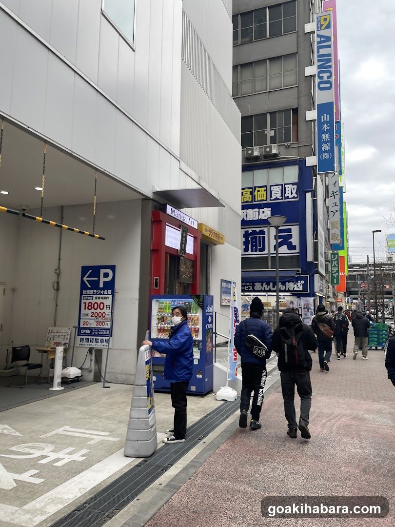Street scene with parking entrance and vending machines