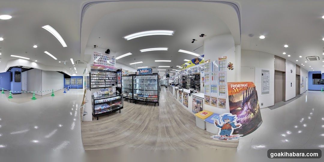 Interior of a store with merchandise displays and posters