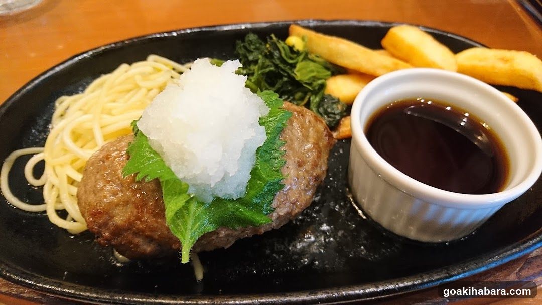 Burger with sides and sauce