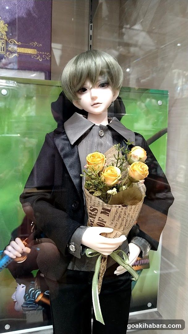 Doll Display with Flowers