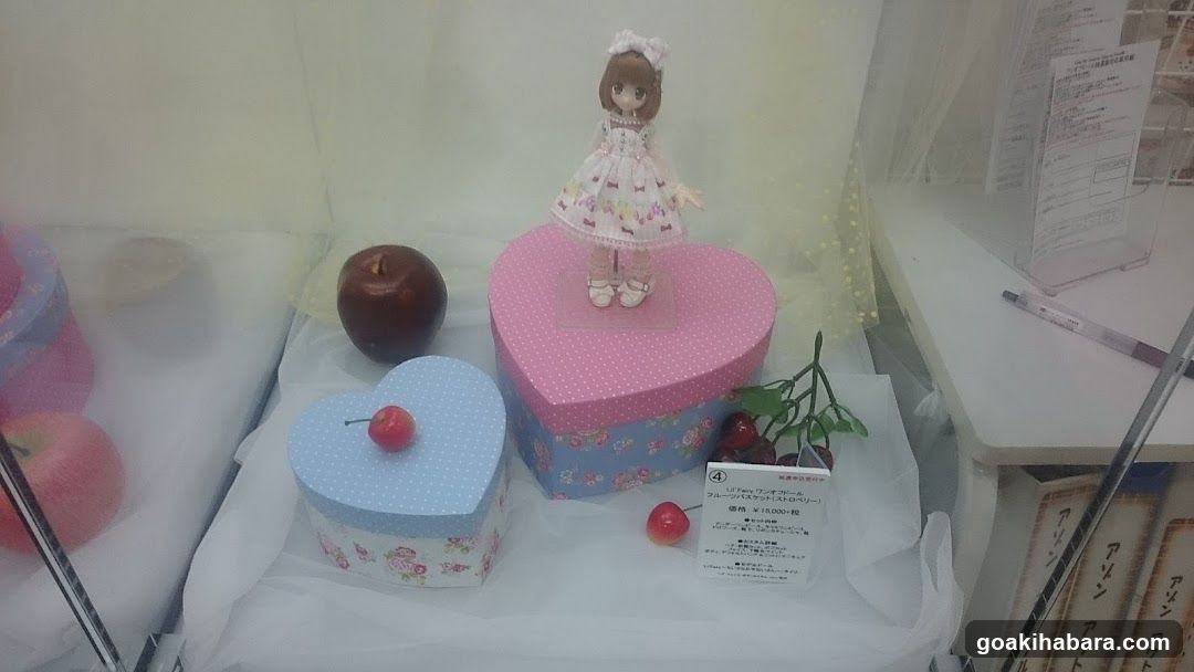 Doll and Heart-Shaped Boxes Display