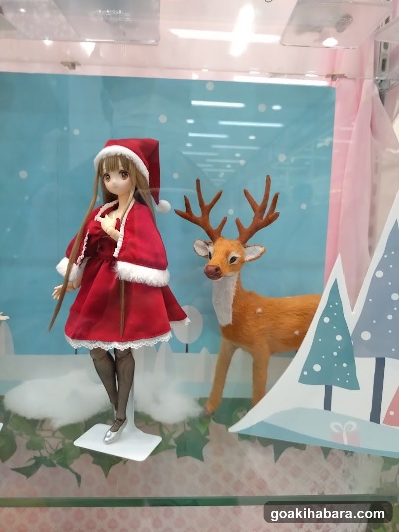 Christmas display with doll and reindeer