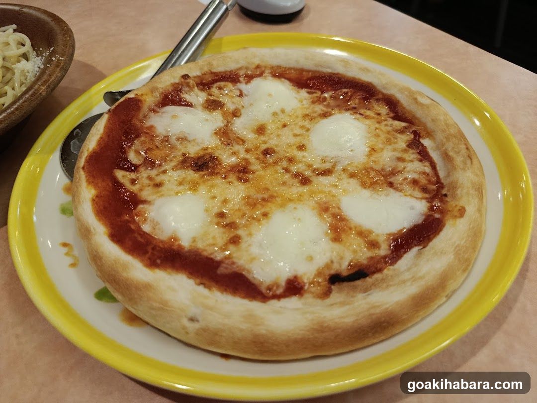 Pizza with Mozzarella on Yellow Plate