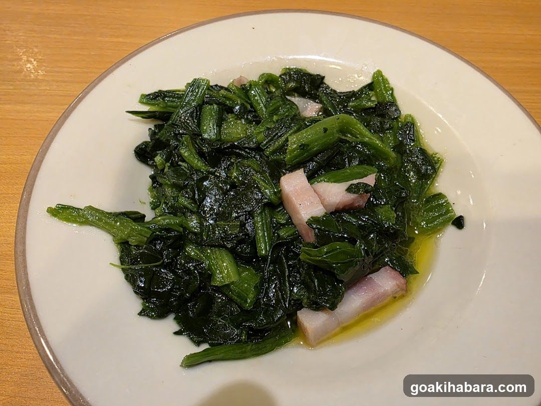 Stir-fried greens with pork belly