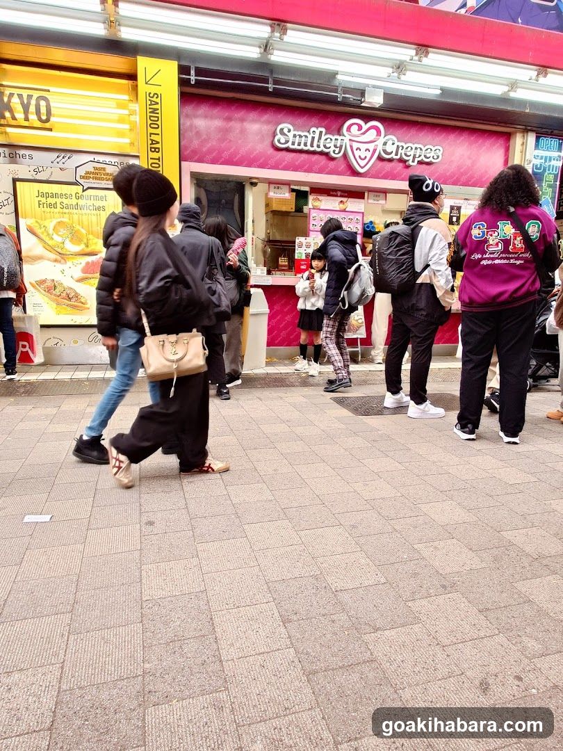 Smiley Crepes and Sando Labito storefronts with customers