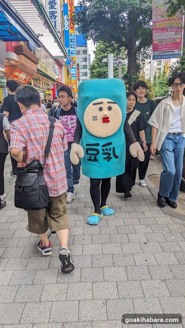 Street scene with mascot and pedestrians