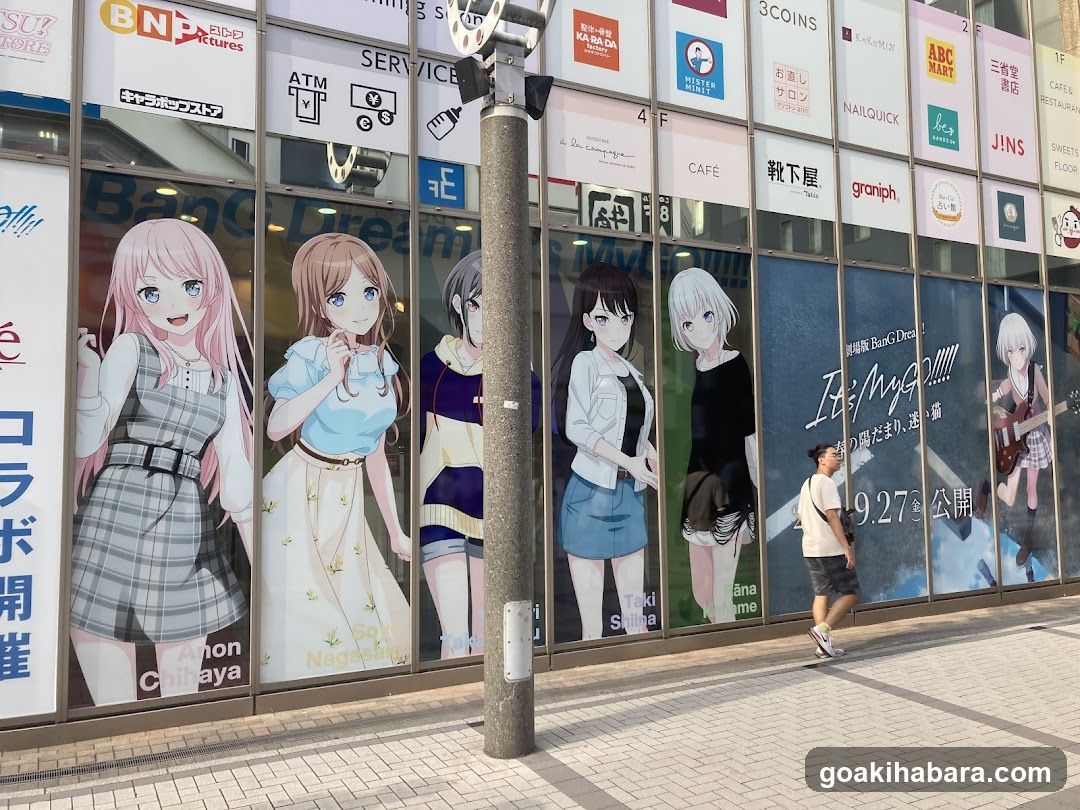 Anime-themed storefront with character posters and signage