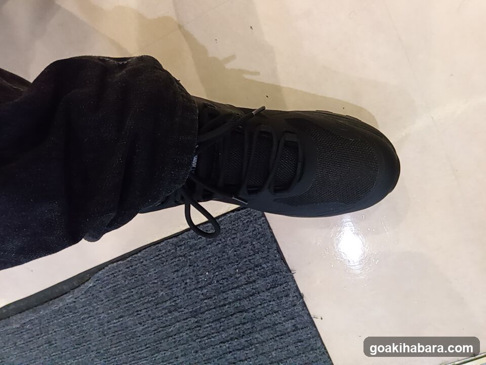 Black Sneaker on Floor
