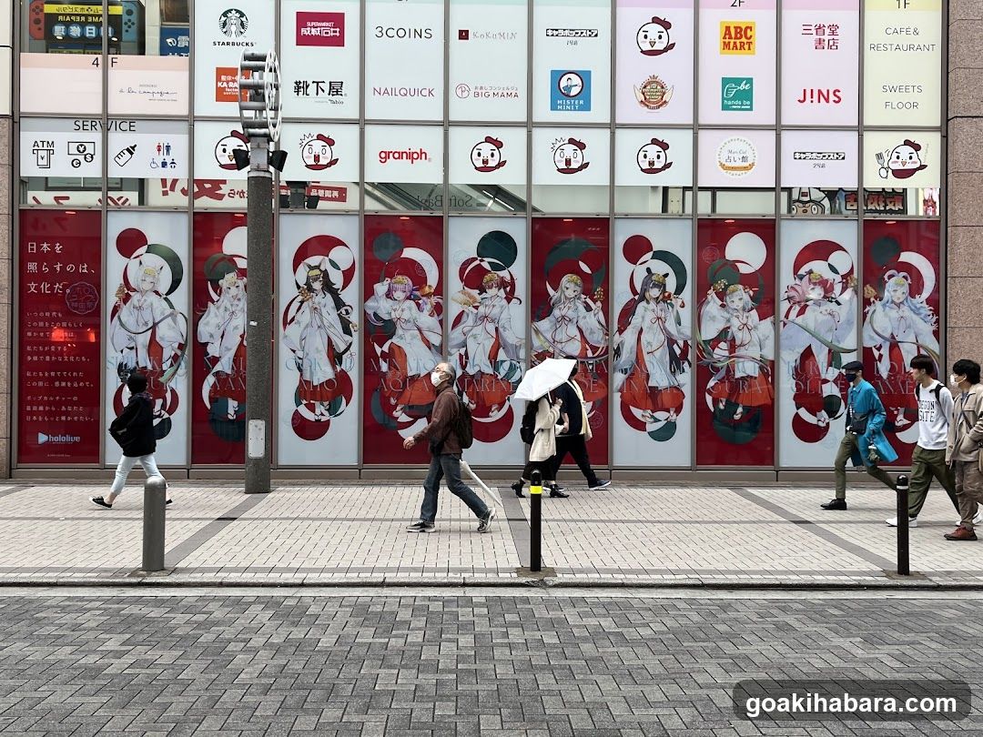 Street level storefront with anime posters and signage