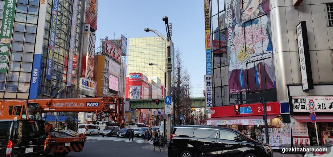 Urban Street Scene with Shops and Vehicles