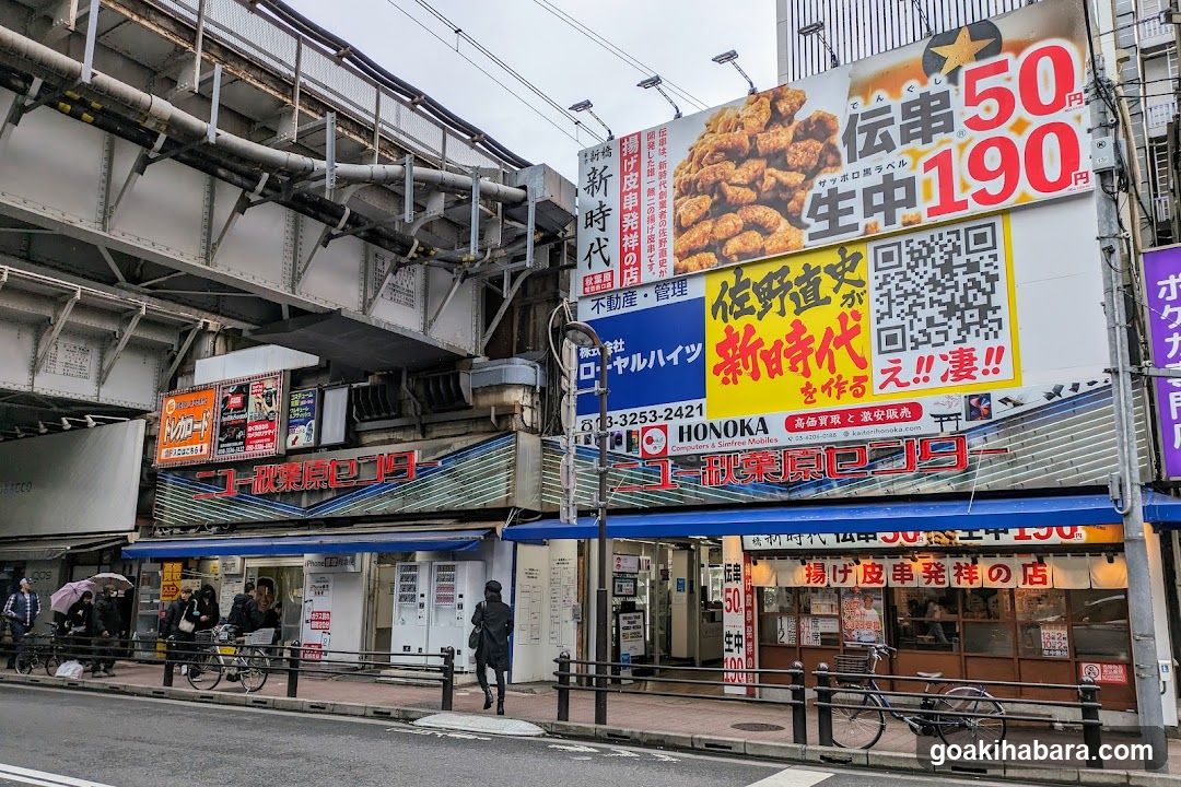 Street scene with shops and signs