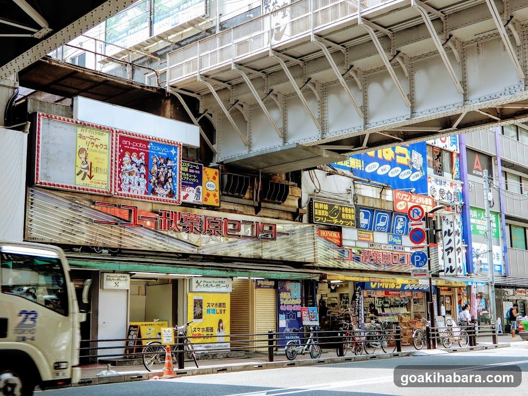 Street scene with shop fronts and signage