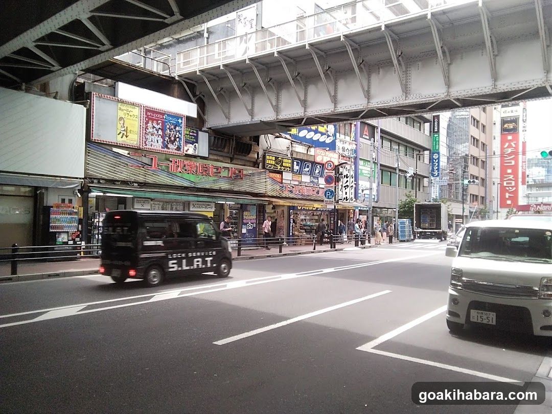 Urban Street Scene with Vehicles and Buildings