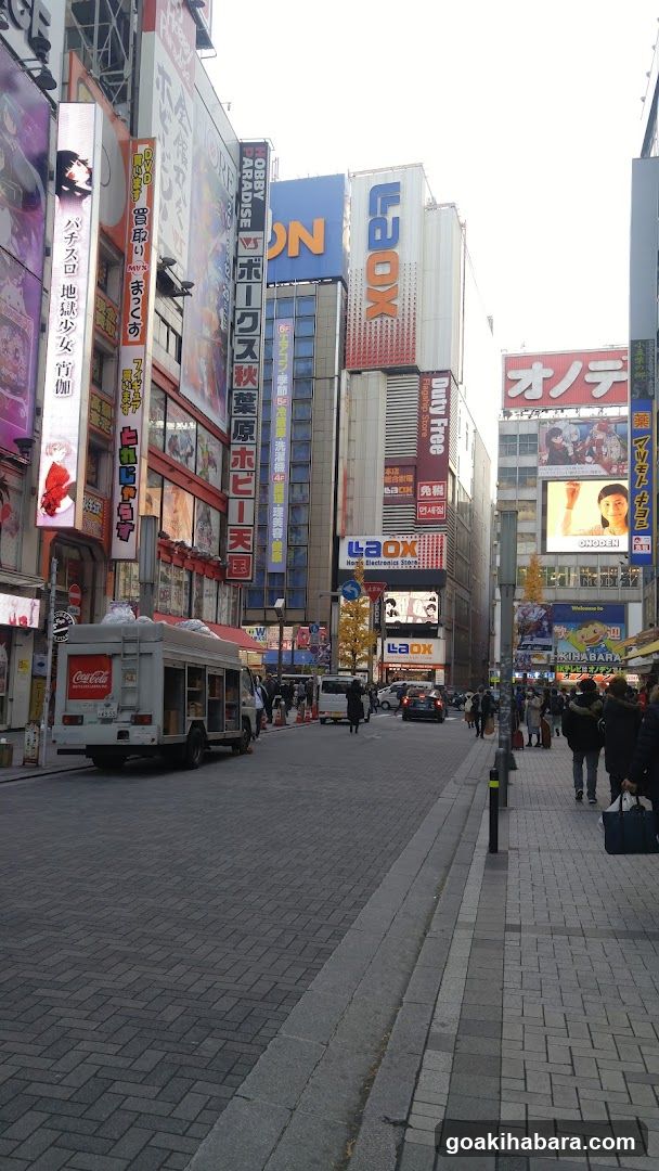 Busy Street with Shops and Signs