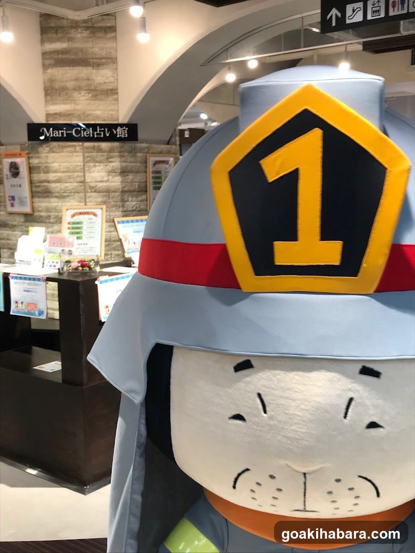 Firefighter Mascot in Store Interior