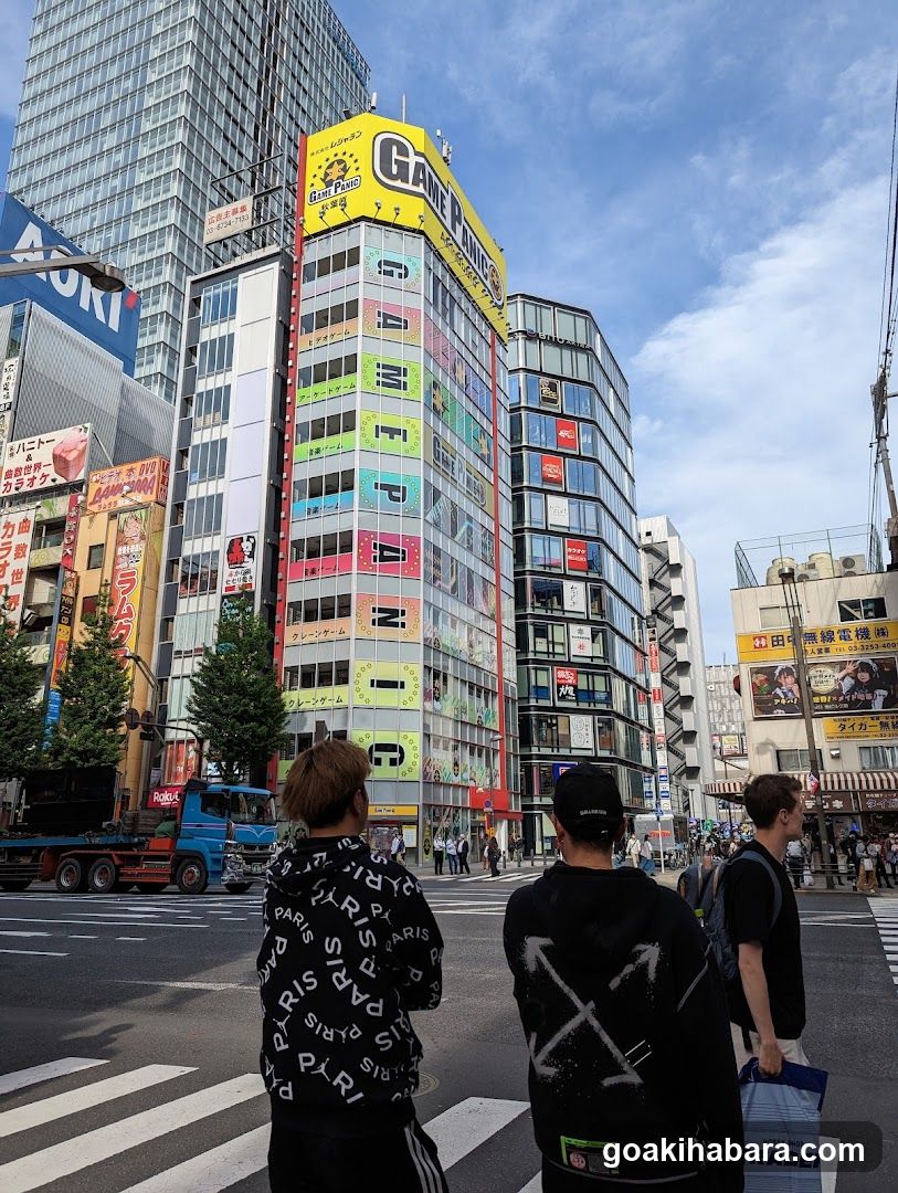 Urban Street Scene with Pedestrians and Buildings