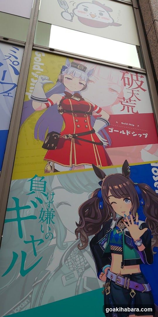 Anime Character Posters on Building Facade