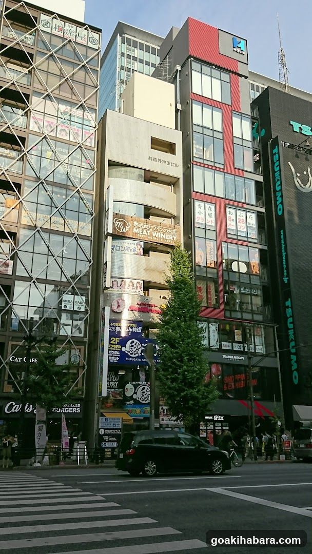 Urban Street Scene with Buildings and Vehicles