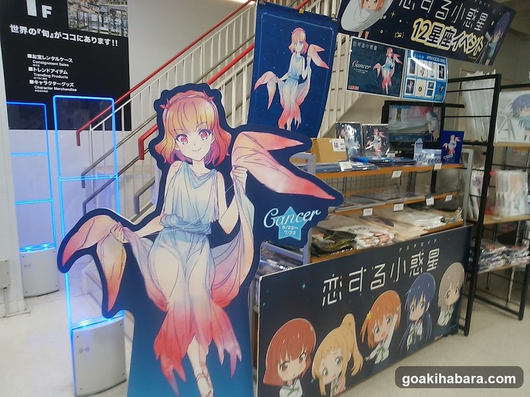 Merchandise display with anime character cutout