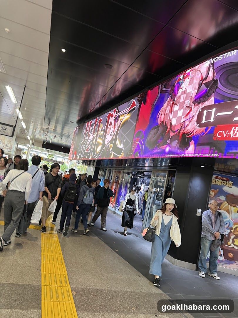 Crowded Station Platform with Anime Advertisement