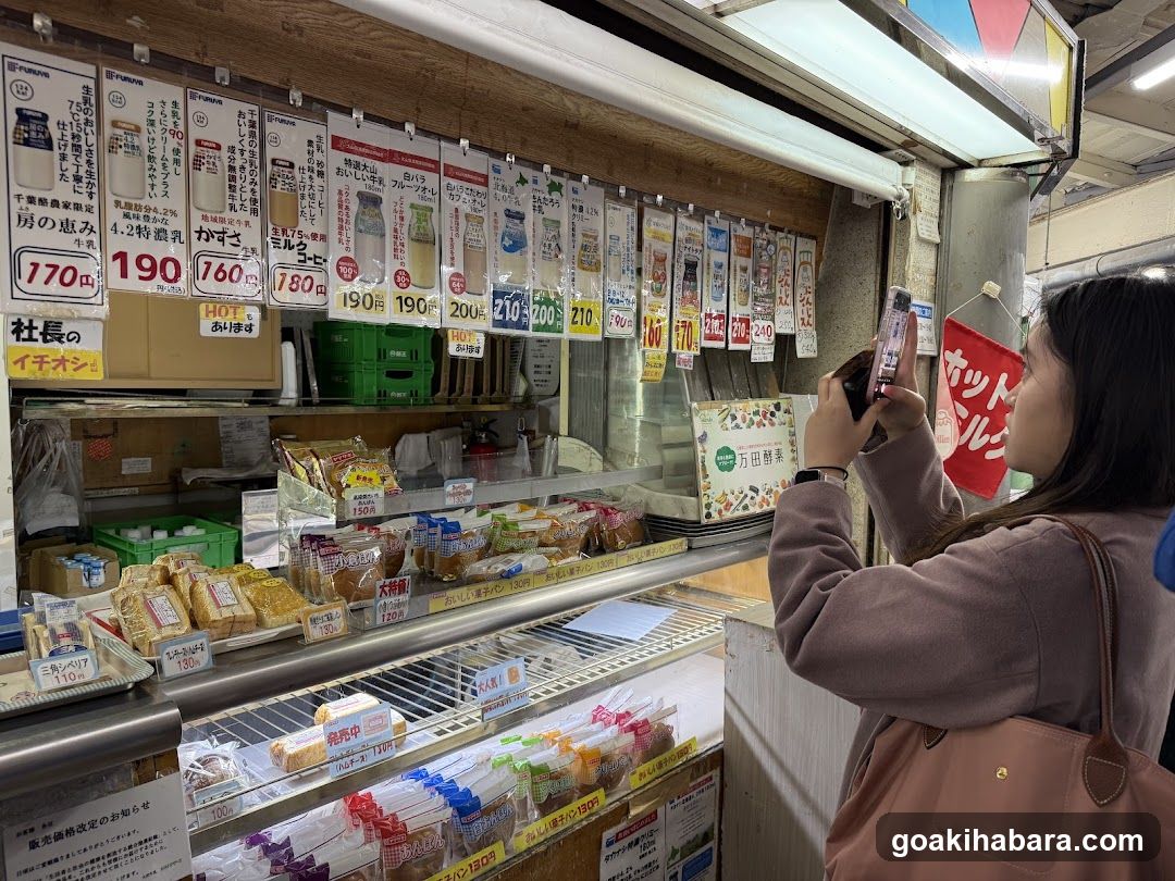Bakery Shop Interior with Customer Taking Photo