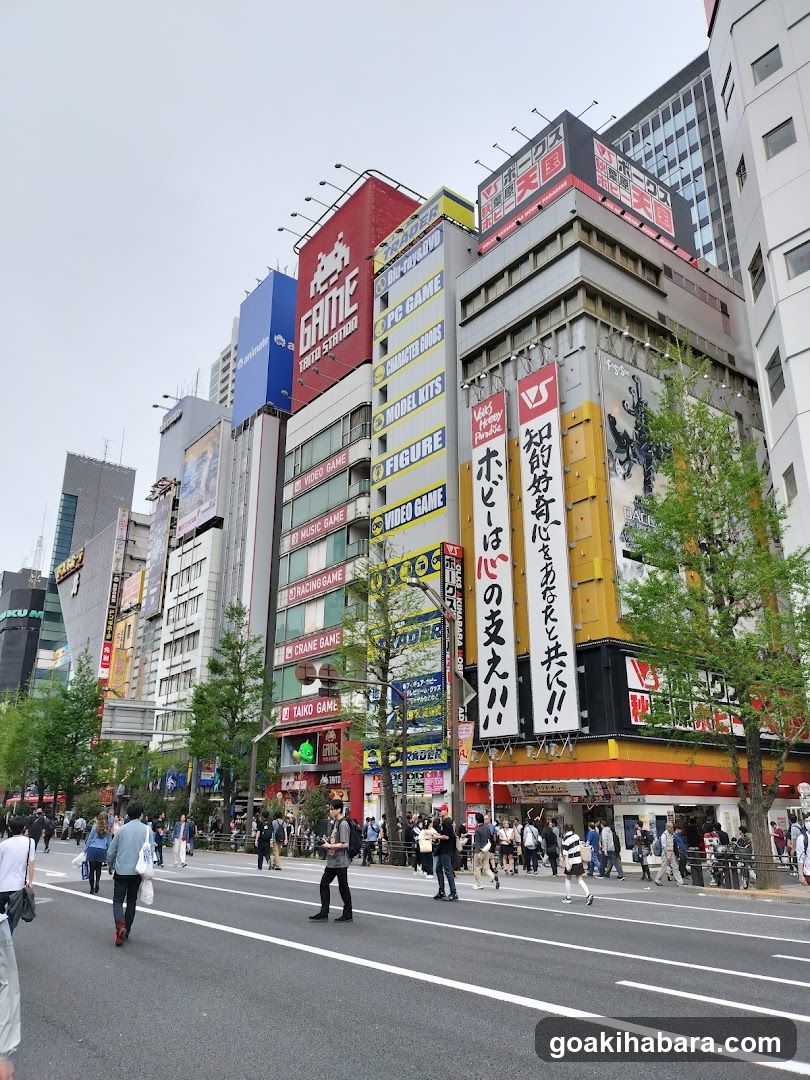 Urban Street Scene with Storefronts and Pedestrians