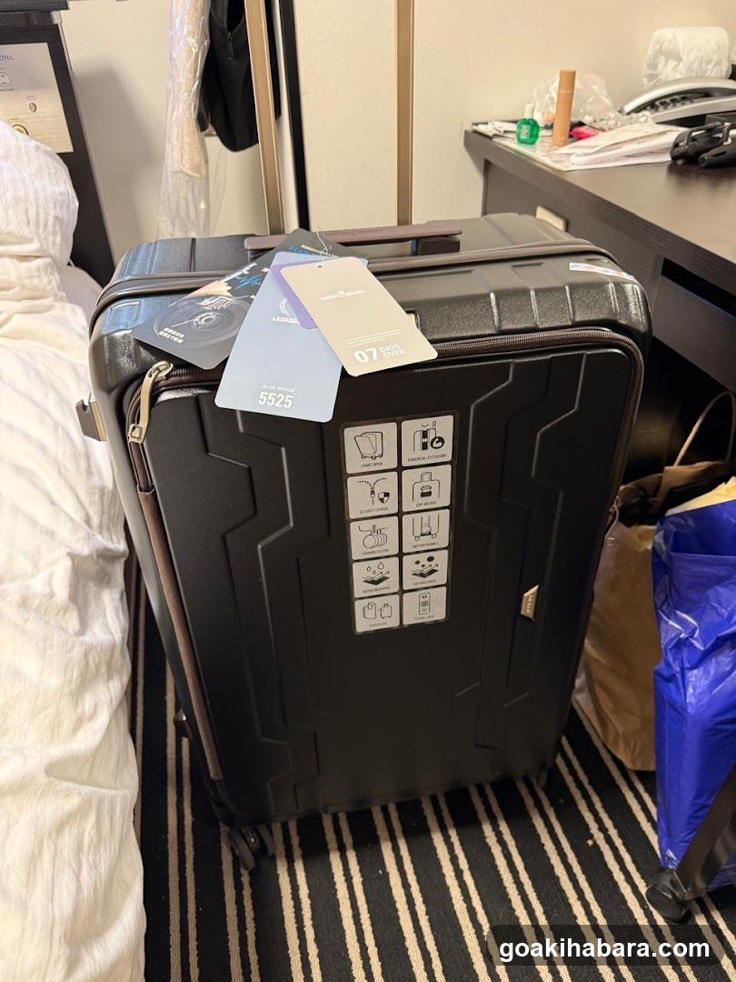Hotel Room with Suitcase