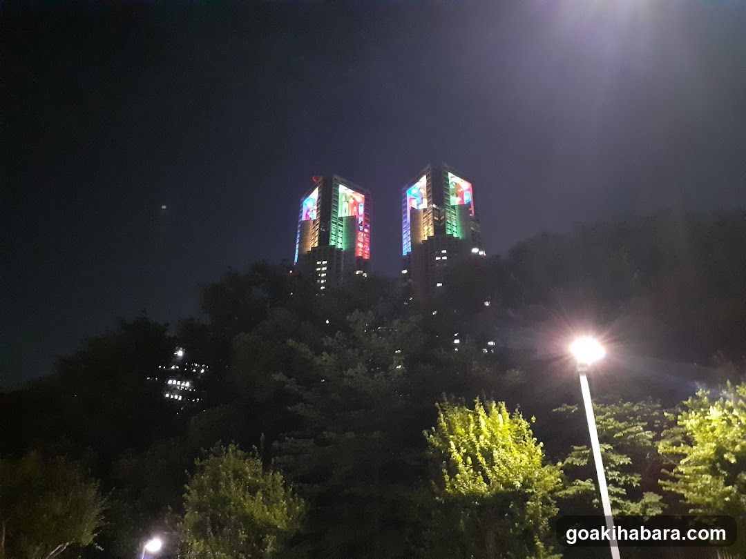 Night Cityscape with Illuminated Towers
