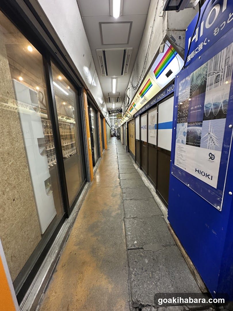 Narrow Alleyway with Storefronts and Construction Board