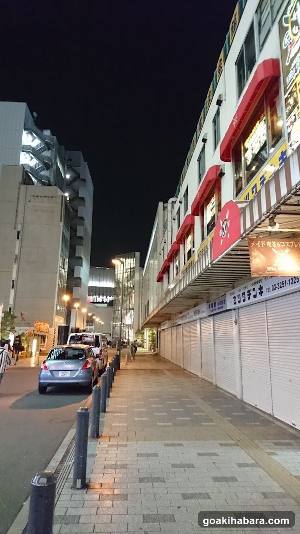 Night street scene with closed shops