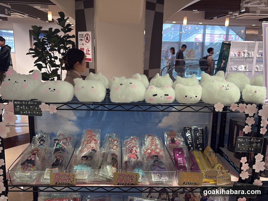 Merchandise Display with Plushies and Acrylic Stands