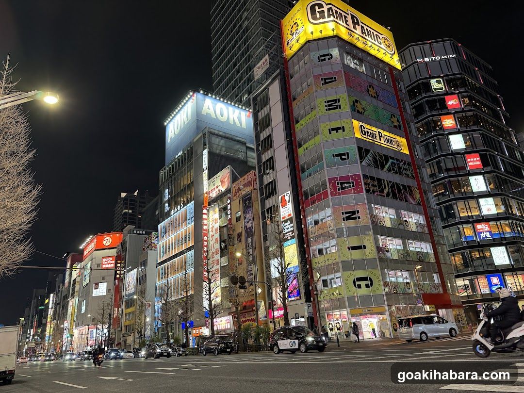 Night Street Scene with Storefronts and Buildings
