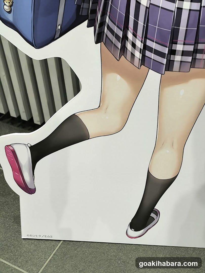 Anime-style cardboard cutout display