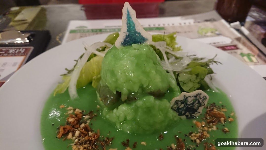 Green Dessert Dish with Decorative Elements