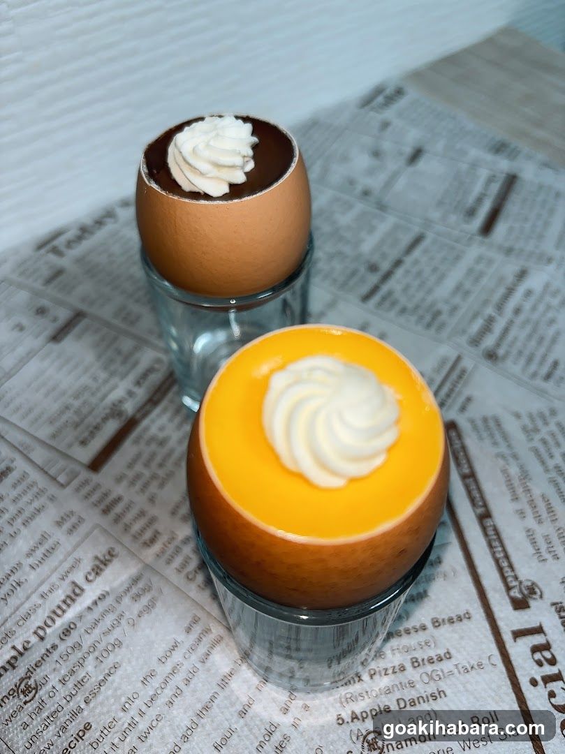 Egg-shaped desserts on newspaper