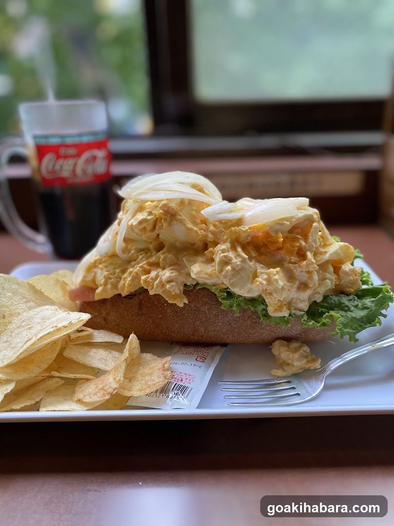 Egg Salad Sandwich with Chips and Coke