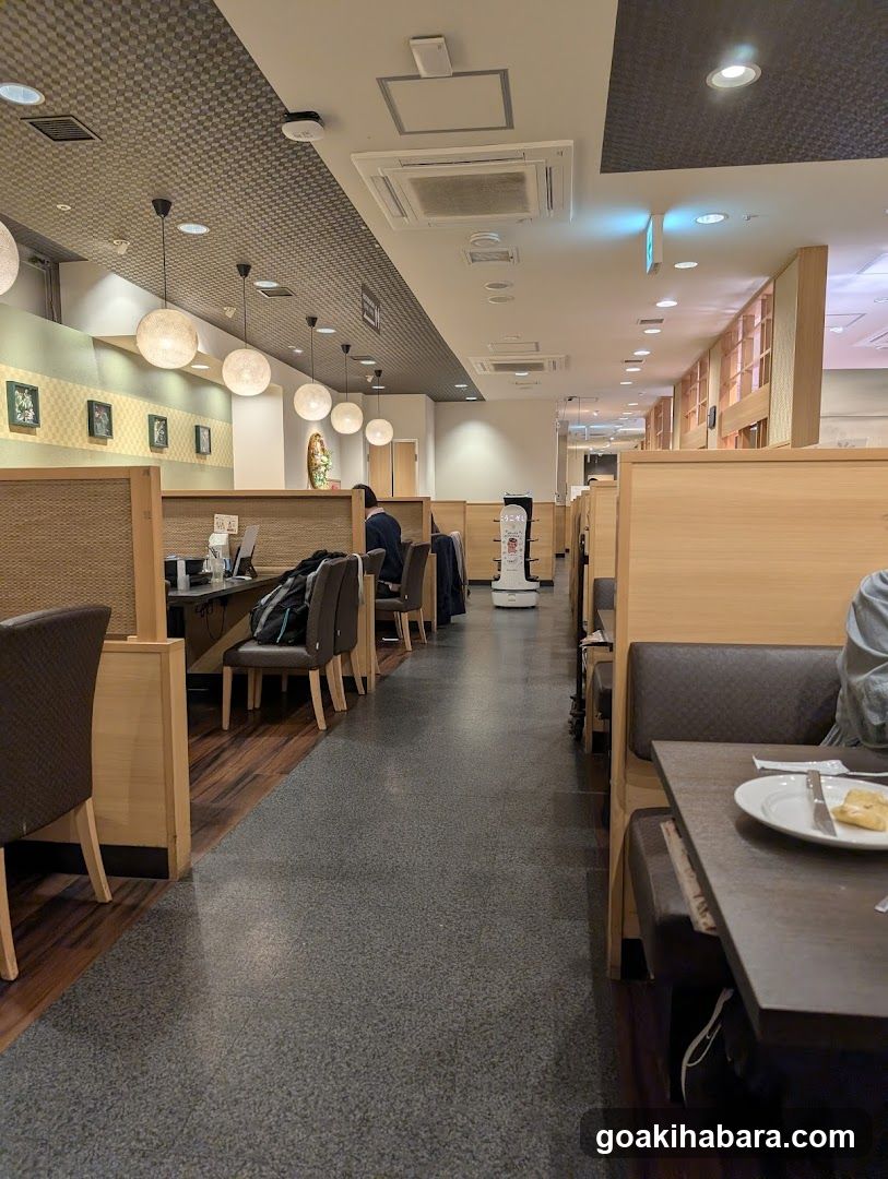 Restaurant Interior with Booth Seating and Service Robot