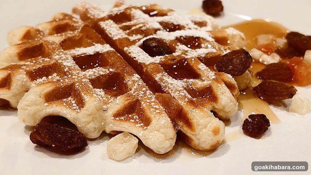 Waffles with Powdered Sugar and Syrup