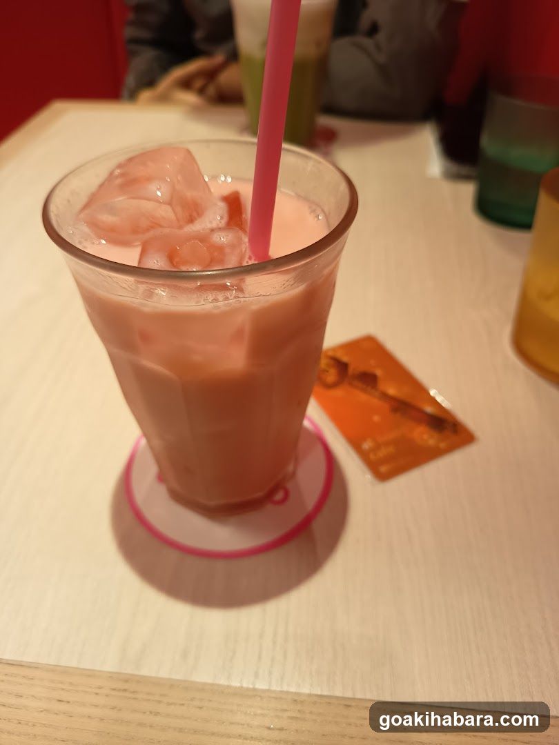 Pink Iced Drink with Straw