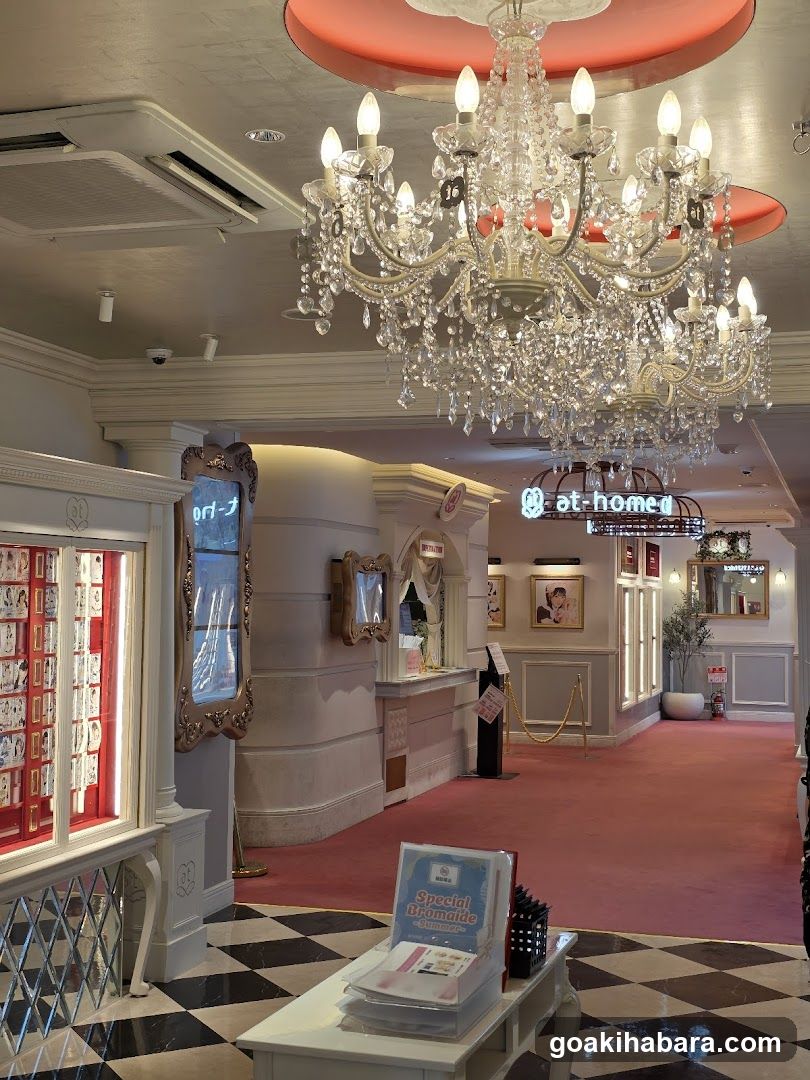 Interior of a retail store with chandelier and display cases