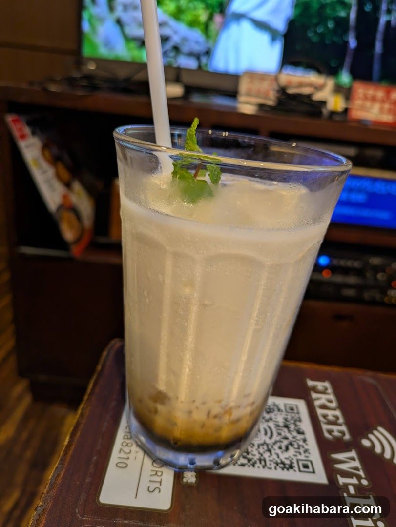 Boba Milk Tea with Mint Garnish