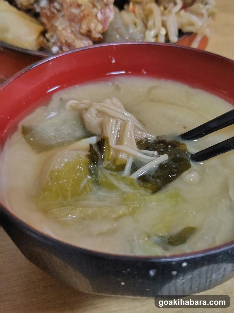 Bowl of Soup with Vegetables and Enoki Mushrooms